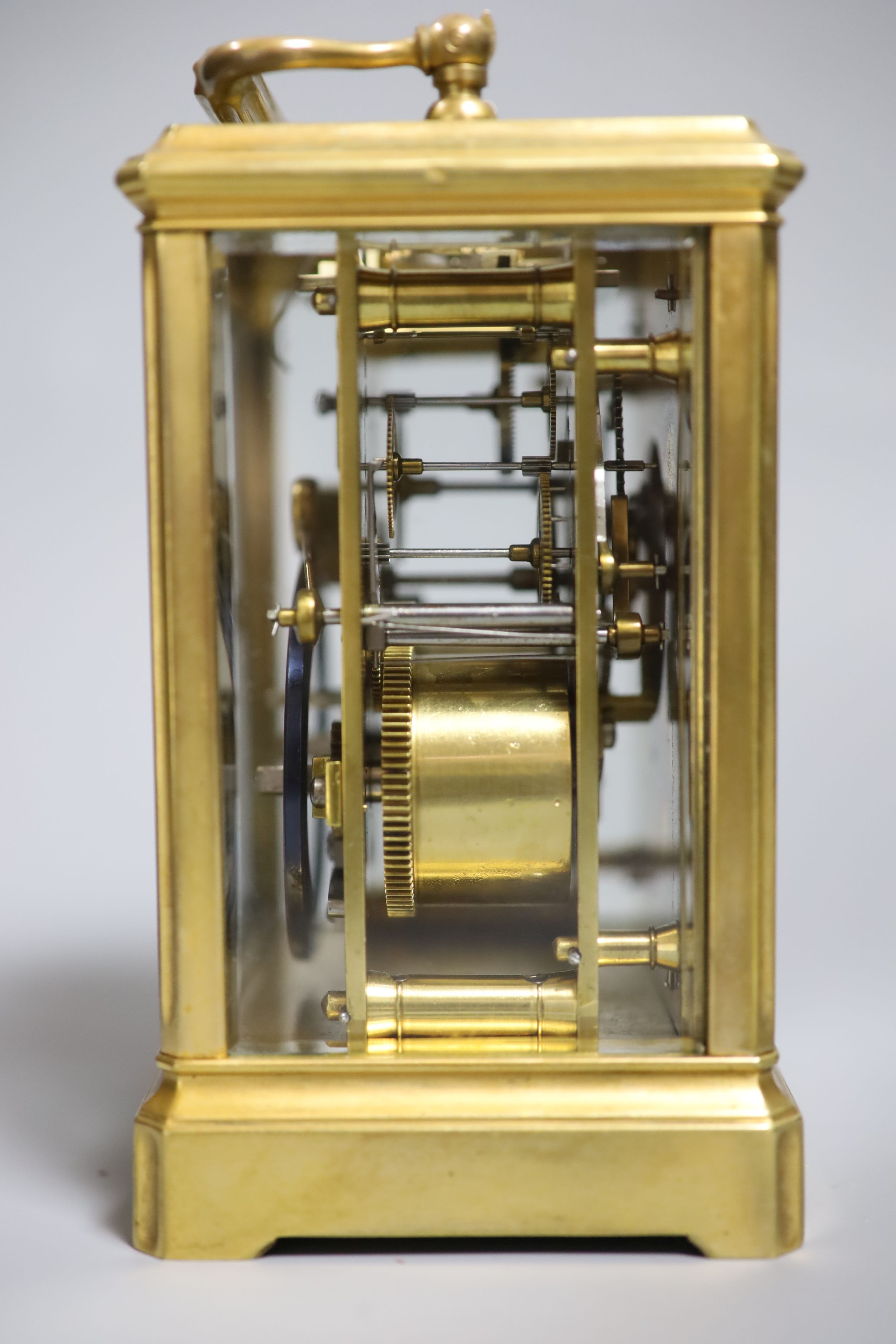 An early 20th century lacquered brass carriage clock, cased